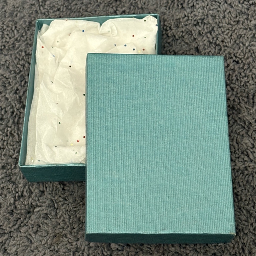 NWT empty blue box with confetti looking tissue paper inside